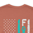 Courage Unveiled: Distressed US Flag with Teal Ribbon PTSD Cotton T-Shirt