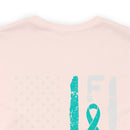 Courage Unveiled: Distressed US Flag with Teal Ribbon PTSD Cotton T-Shirt