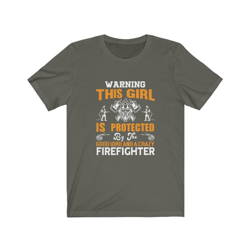 US Warning this Girl is Protected by the Good Lord and a Crazy Firefighter Unisex Short Sleeve Shirt.