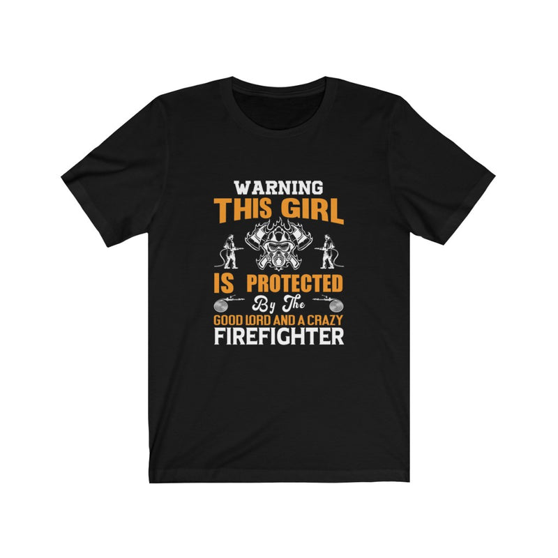 US Warning this Girl is Protected by the Good Lord and a Crazy Firefighter Unisex Short Sleeve Shirt.